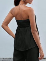 Top a maglia senza maniche a fascia per donne con stampa leopardata