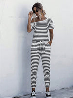 Jumpsuit Maglietta monocolore scollatura asimmetrica con coulisse a vita tasca inclinata