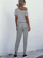 Jumpsuit Maglietta monocolore scollatura asimmetrica con coulisse a vita tasca inclinata