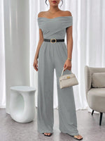 Tuta Elegante Casual A Gamba Ampia Con Pieghe A Spalle Scoperte E In Colore Tinta Unita