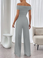 Tuta Elegante Casual A Gamba Ampia Con Pieghe A Spalle Scoperte E In Colore Tinta Unita