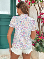 Camicetta con stampa floreale con cravatta al collo con manica a sbuffo