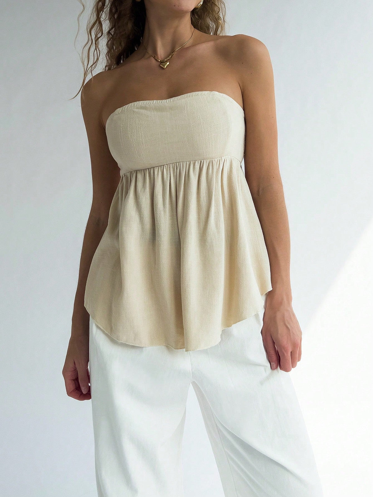 Top a maglia senza maniche a fascia per donne con stampa leopardata