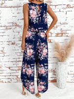 Top di stile vacanziero elegante stampato a pois per signore con pantaloni a gamba larga con spacco avanti