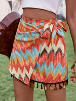 Gonna di stile bohemien con decorazione a nappina