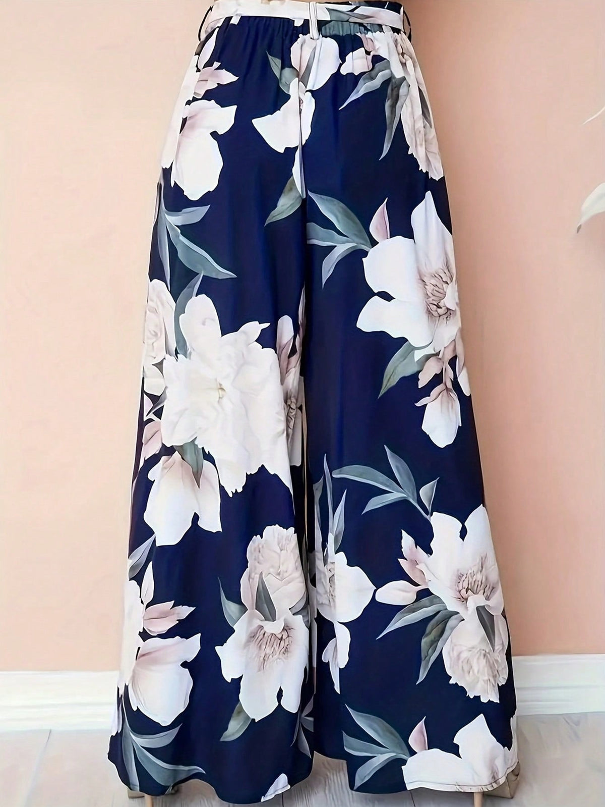 Pantaloni stampati a vita alta con cintura stringata e gambe larghe