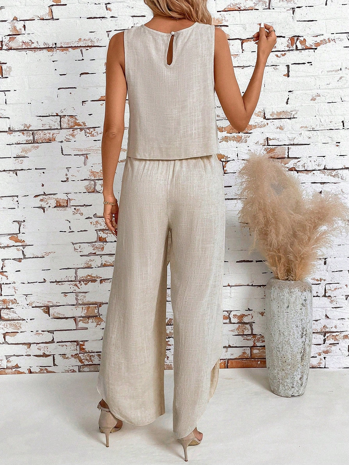 Top di stile vacanziero elegante stampato a pois per signore con pantaloni a gamba larga con spacco avanti