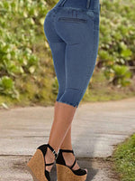 Jeans casual capri aderenti donna con chiusura a bottoni