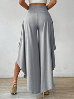 Pantaloni a gamba larga vita alta orlo asimmetrico