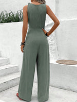 Salopette blu navy con scollo a V e cinturino intrecciato per donne