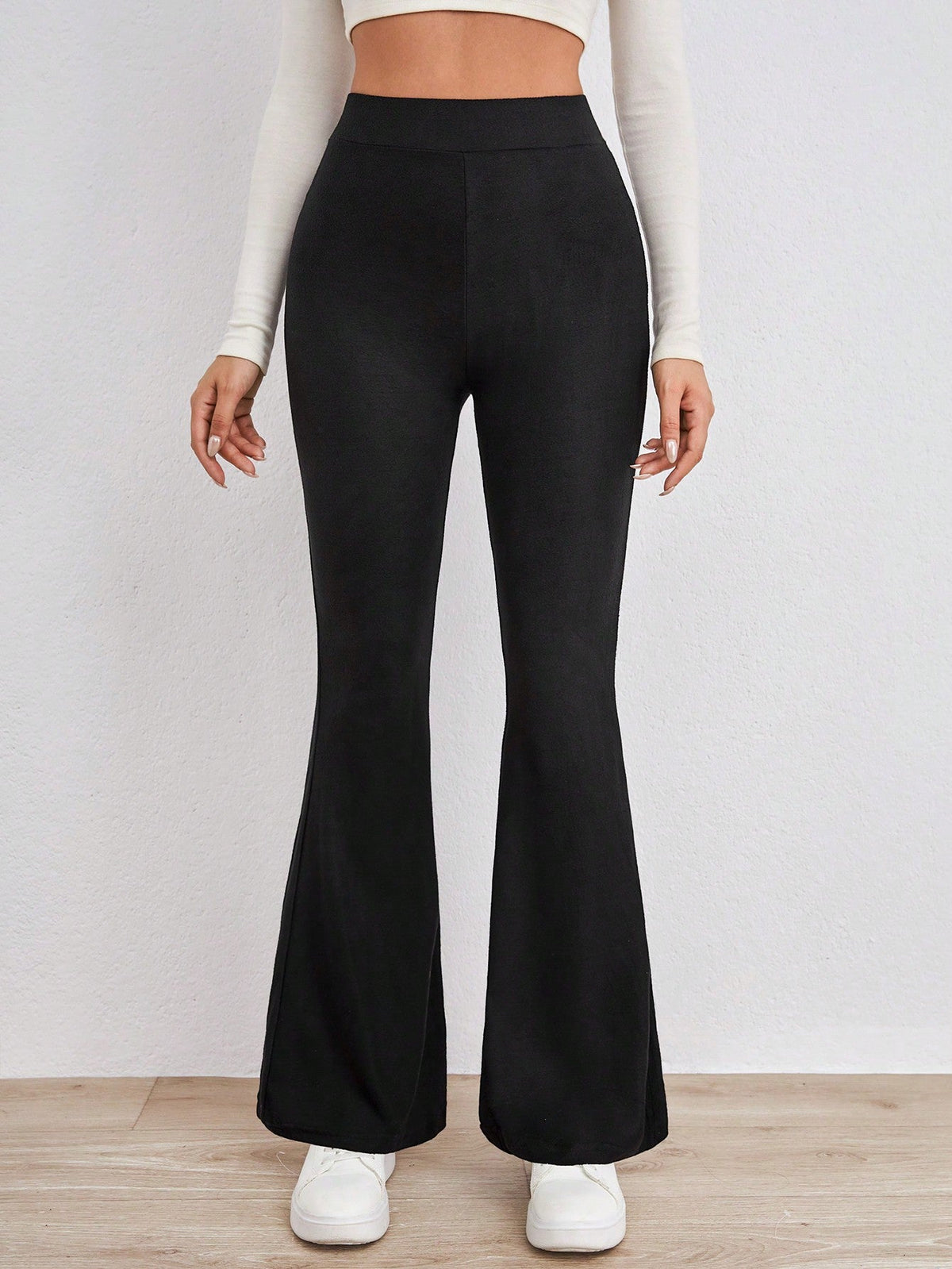 Pantaloni svasati con stampa leopardo