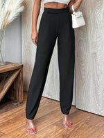 Pantaloni a carota vita media monocromatici da donna