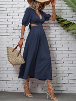 Abito trapezio scollo profondo con cut out sulla vita