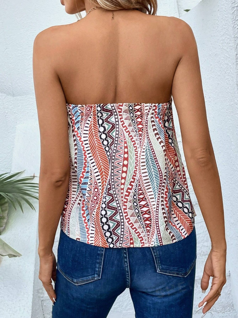 Top tubo con stampa geo e slogan