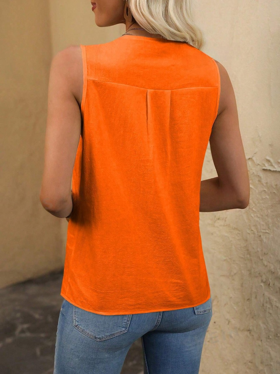 Camicia senza maniche con bottoni frontali e colore tinta unita per l\"estate