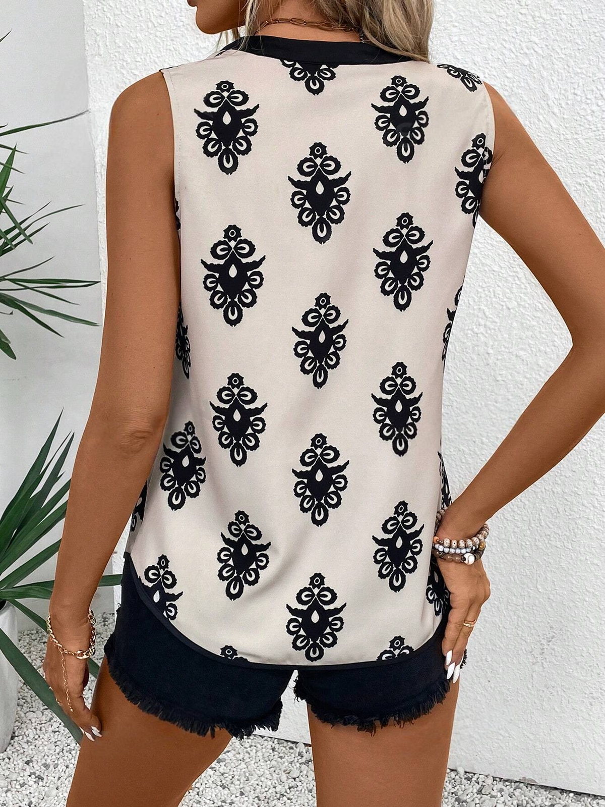 Blusa da donna senza maniche con scollo a V e blocchi di colore