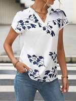 Camicetta con stampa floreale con manica a pipistrello scollo dentellato