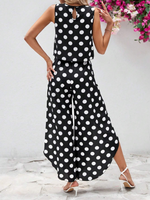 Top di stile vacanziero elegante stampato a pois per signore con pantaloni a gamba larga con spacco avanti