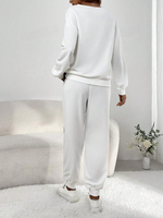 Pantaloni sportivi & Felpa paillette a contrasto spalle cadenti