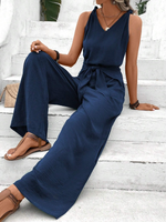 Salopette blu navy con scollo a V e cinturino intrecciato per donne