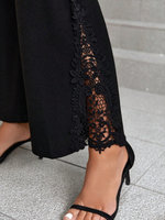 Pantaloni svasati pizzo a contrasto