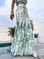 Pantaloni a palazzo con stampa di piante, outfit da crociera per donne