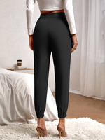 Pantaloni monocolore doppie tasche potati