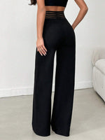 Pantalone Nero A Gamba Larga In Tessuto Di Lycra A Maglia Larga, Con Cintura Elastica A Righe Semi-trasparente E Vita A V