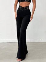 Pantalone Nero A Gamba Larga In Tessuto Di Lycra A Maglia Larga, Con Cintura Elastica A Righe Semi-trasparente E Vita A V