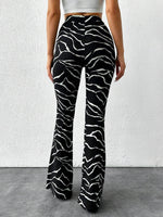 Pantaloni svasati con stampa leopardo