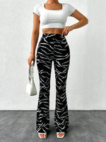 Pantaloni svasati con stampa leopardo