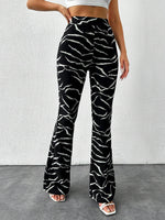 Pantaloni svasati con stampa leopardo