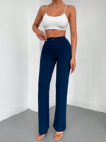 Pantaloni lunghi a svasatura eleganti a vita alta con bottoni e cerniere per le donne