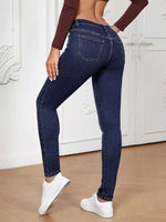 Jeans skinny tasca inclinata