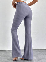 Pantaloni a zampa d'elefante in vita alta e lunghezza extra alta