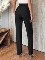 Pantaloni a carota vita media monocromatici da donna