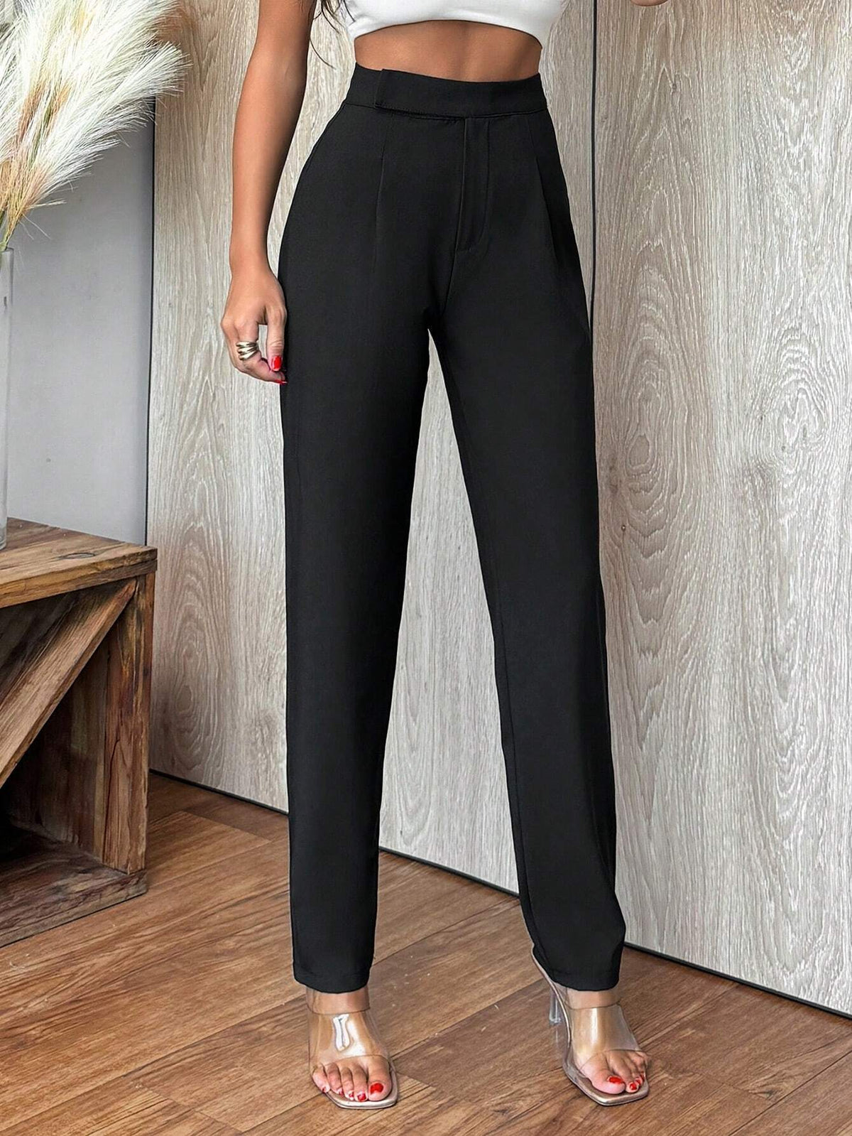 Pantaloni a carota vita media monocromatici da donna