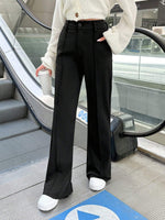 Pantaloni a zampa alta vita alta di colore unito da donna