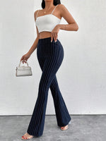 Pantaloni a zampa d'elefante in vita alta e lunghezza extra alta