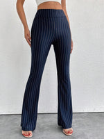 Pantaloni a zampa d'elefante in vita alta e lunghezza extra alta