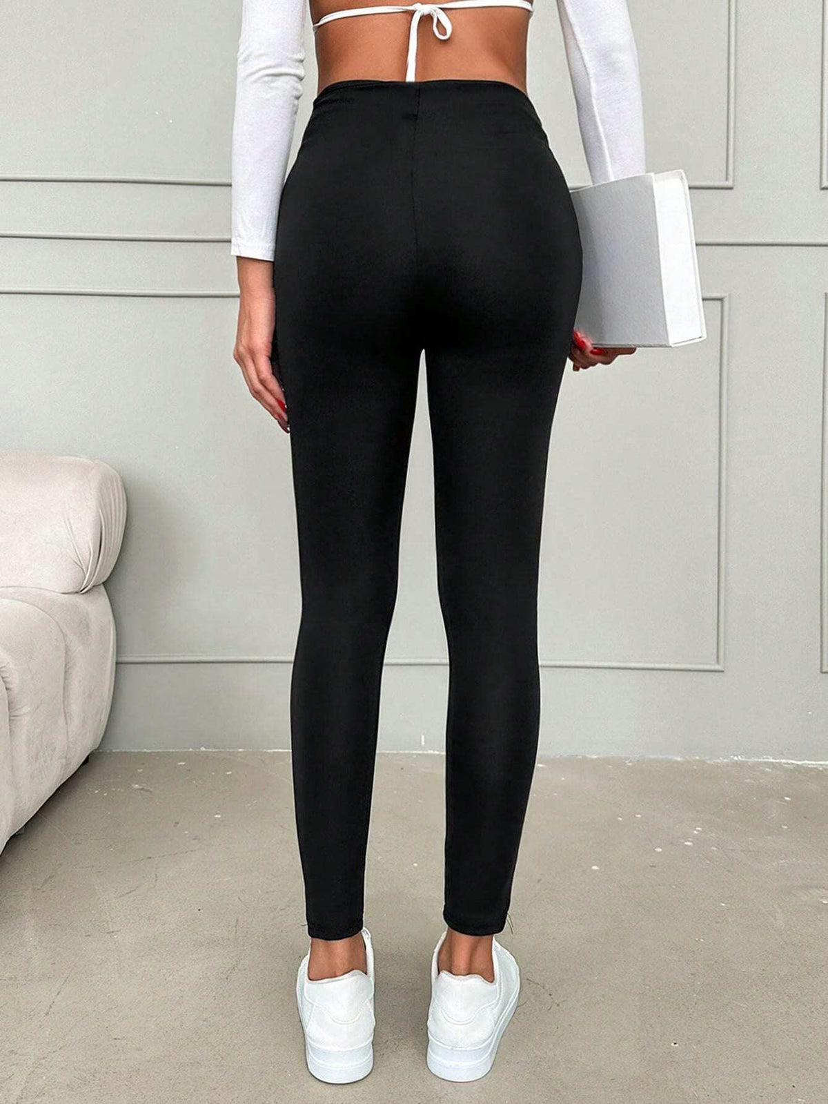 Pantaloni aderente con coulisse frontale