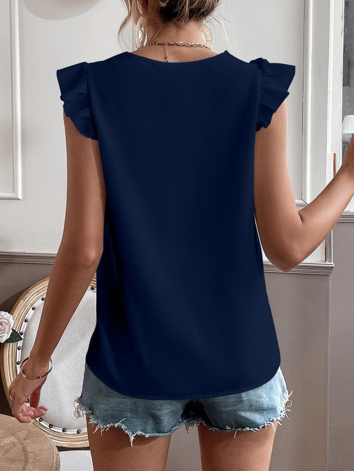 Camicetta con bordo di pizzo manica ad aletta