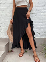 Gonna con orlo a fessura vita alta con bordo a volant