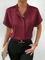 Camicia a maniche corte tinta unita con colletto alla coreana e chiusura frontale con bottoni per abbigliamento casual