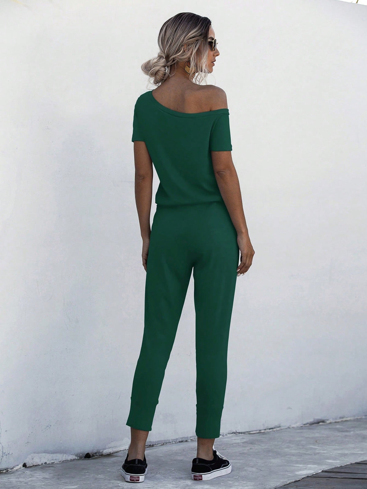 Jumpsuit Maglietta monocolore scollatura asimmetrica con coulisse a vita tasca inclinata
