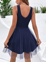 Abito in maglia sovrapposta con perle