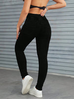 Jeans skinny vita alta con bottone