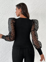 Top in tulle con manica a sbuffo