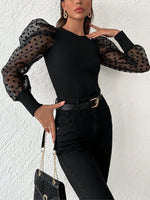 Top in tulle con manica a sbuffo