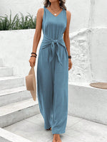 Salopette blu navy con scollo a V e cinturino intrecciato per donne